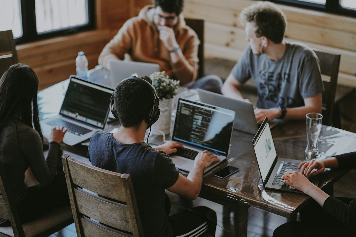 A team sharing ideas around a table
